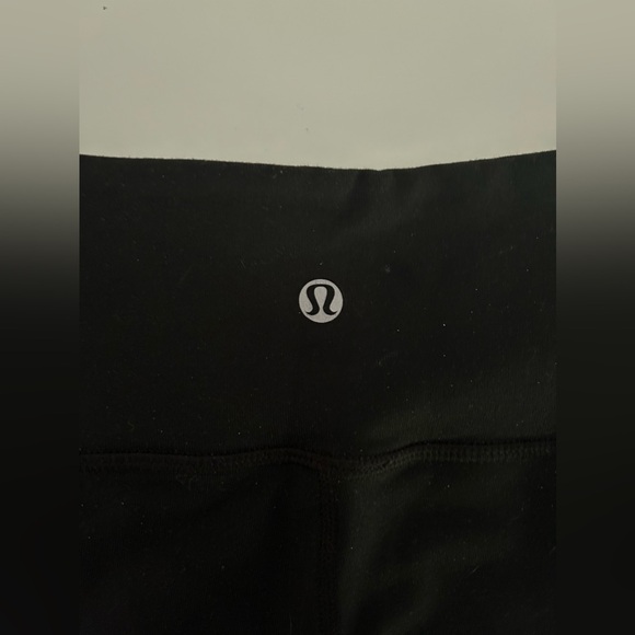 Lululemon Wunder Under pants with blue colour-blocked panels. - Picture 6 of 7